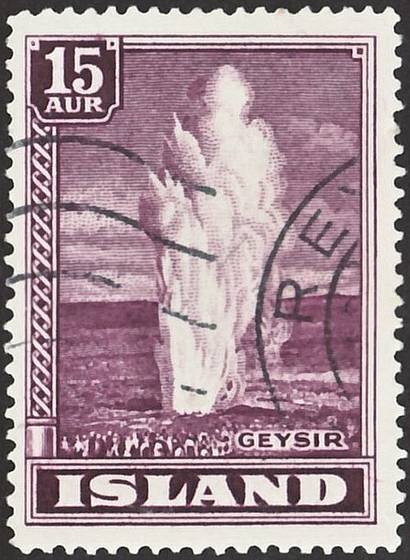 A violet Icelandic stamp of a geyser